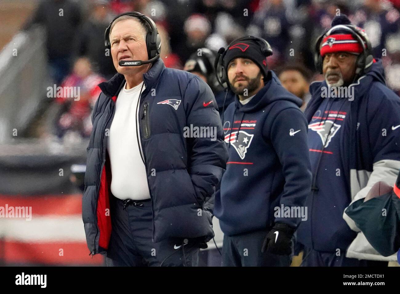 New England Patriots head coach Bill Belichick looks up to the replay  during the first half of an NFL football game against the Tennessee Titans,  Sunday, Nov. 28, 2021, in Foxborough, Mass. (