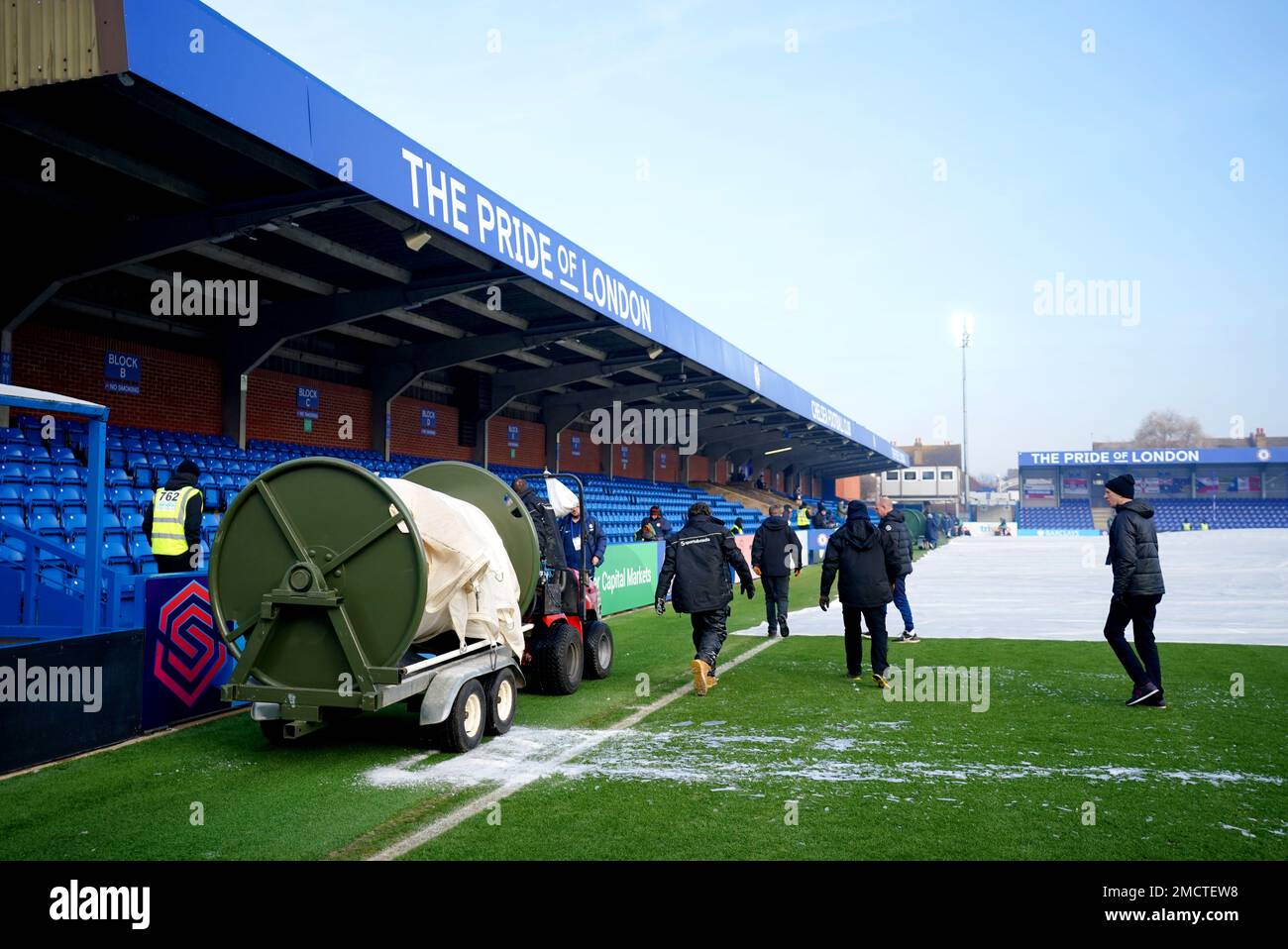 Covers are removed from the pitch ahead of the Barclays Women's Super League match at Kingsmeadow, London. Picture date: Sunday January 22, 2023. Stock Photo