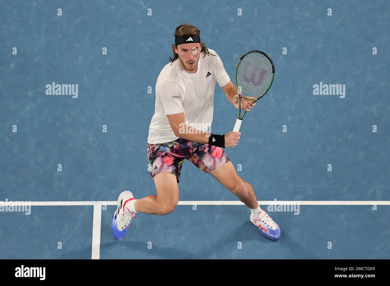 Melbourne, Australia. 22nd Jan, 2023. Stefanos Tsitsipas of Greece in action during round 4 match between Stefanos Tsitsipas of Greece and Jannick Sinner of Italy, Day 6 at the Australian Open Tennis 2023 at Rod Laver Arena, Melbourne, Australia on 22 January 2023. Photo by Peter Dovgan. Editorial use only, license required for commercial use. No use in betting, games or a single club/league/player publications. Credit: UK Sports Pics Ltd/Alamy Live News Stock Photo