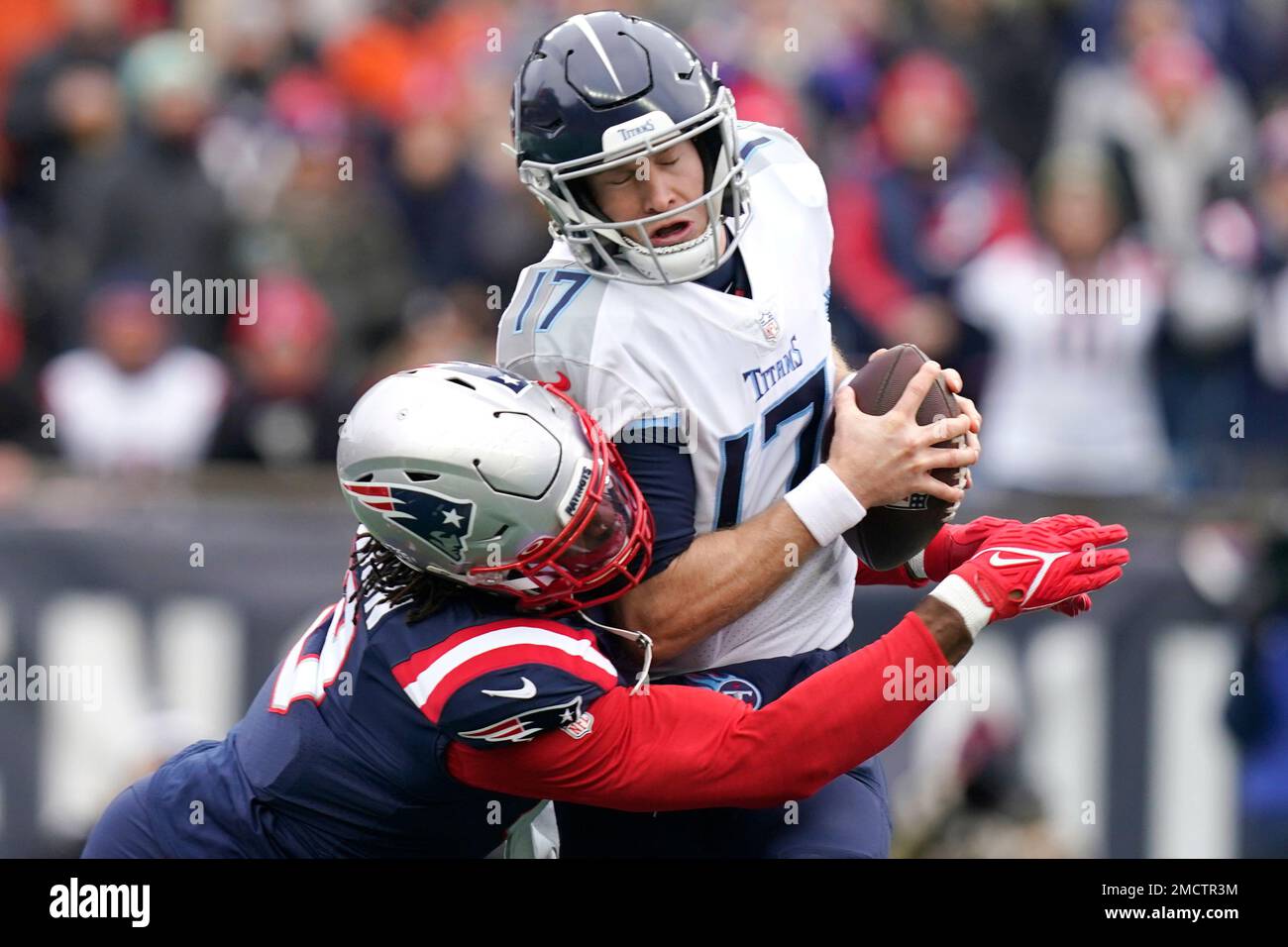 Tennessee Titans quarterback Ryan Tannehill (17) is sacked by New England  Patriots outside linebacker Matt Judon, left, during the first half of an  NFL football game, Sunday, Nov. 28, 2021, in Foxborough,