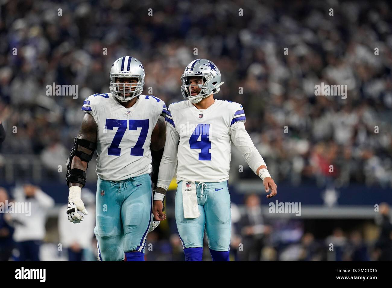 Dallas Cowboys quarterback Dak Prescott (4) looks to pass during a Thanksgiving  day NFL football game against the Las Vegas Raiders, Thursday, Nov. 25,  2021, in Arlington, Texas. (AP Photo/Matt Patterson Stock