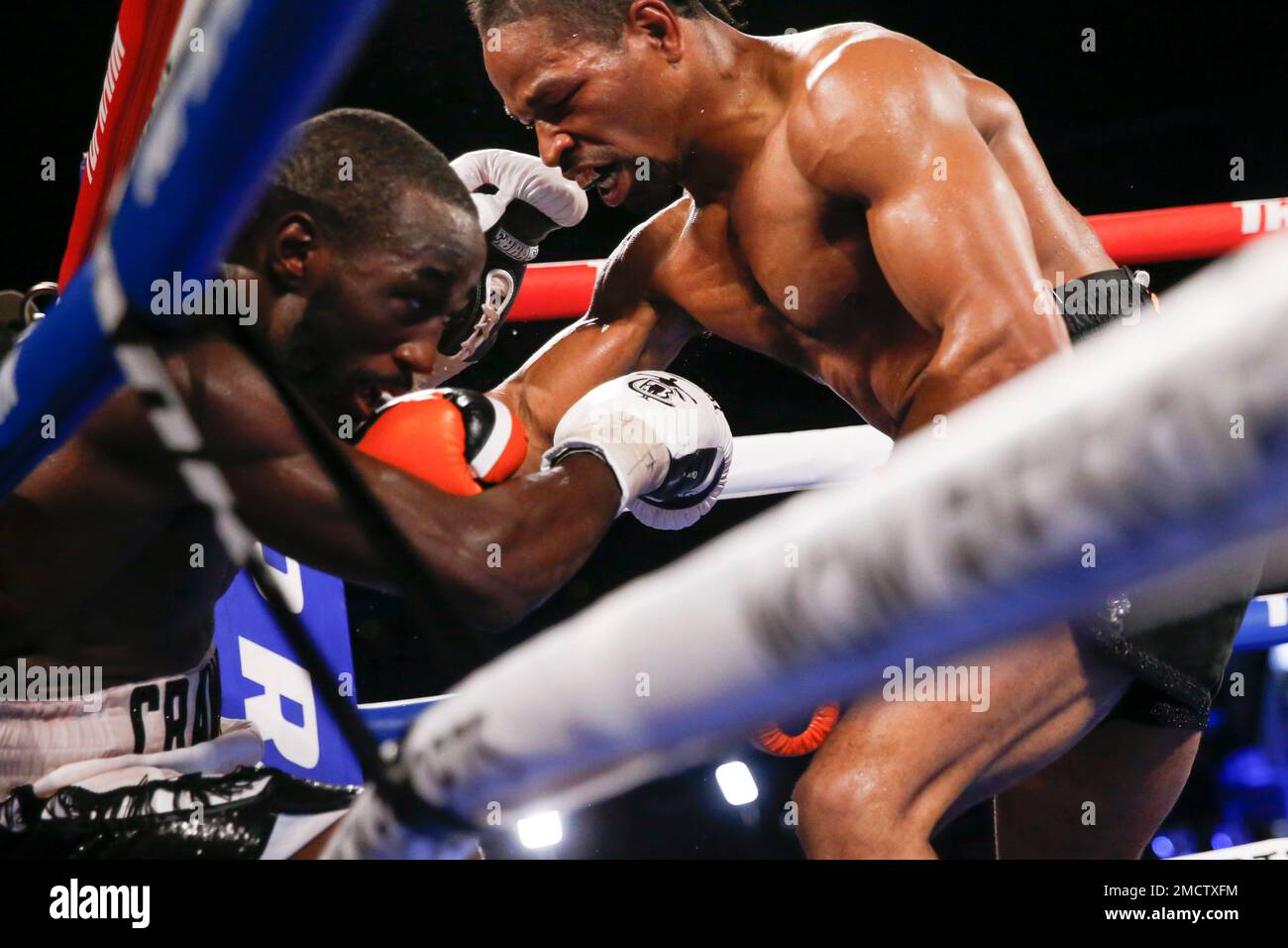 Shawn Porter, right, fights Terence Crawford during a welterweight