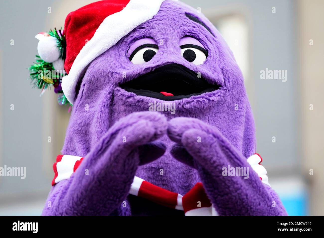 McDonald's Grimace rides a float in the Macy's Thanksgiving Day Parade