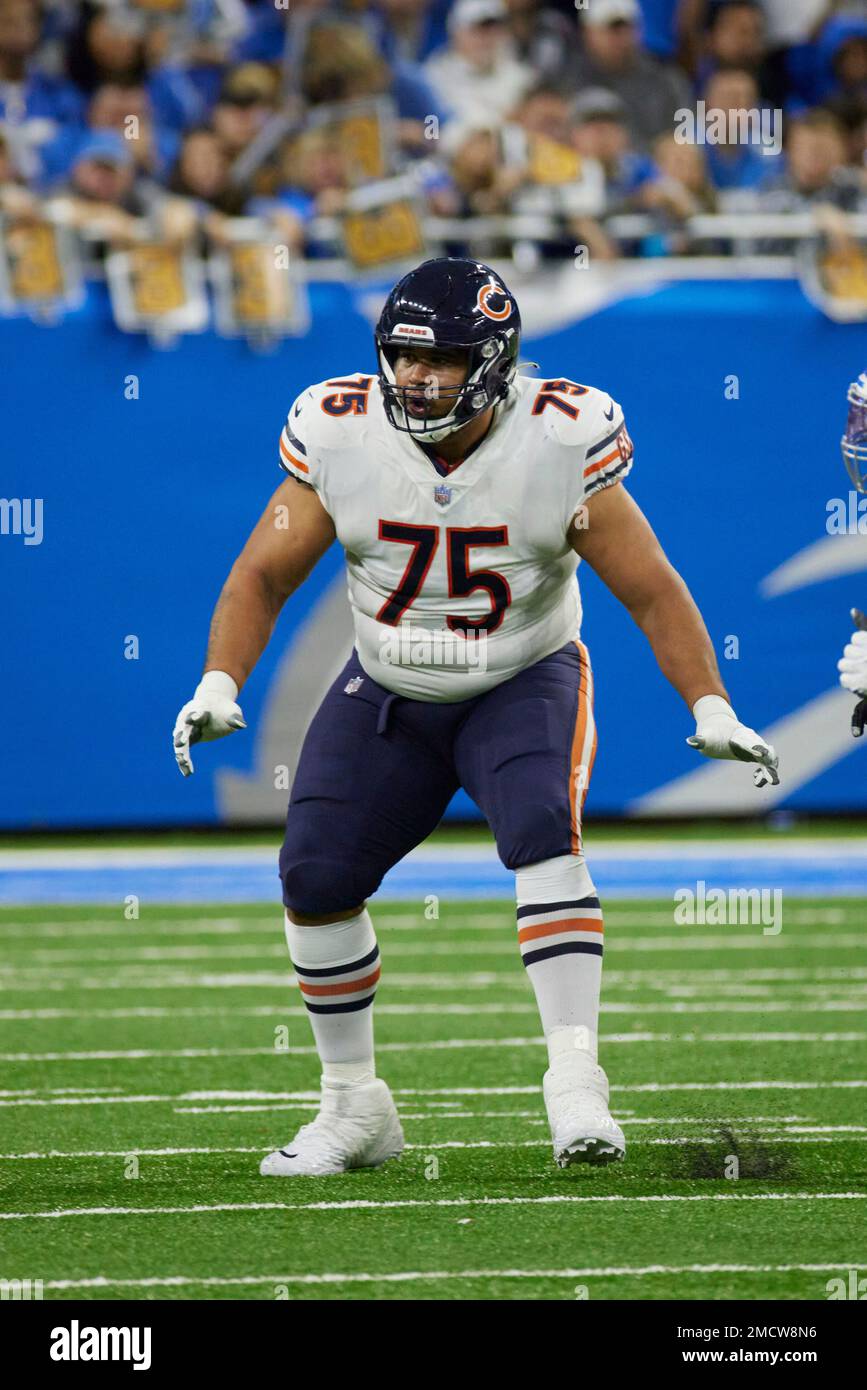 Chicago Bears tackle Larry Borom (75) runs off the field at halftime of an  NFL football game against the New England Patriots, Monday, Oct. 24, 2022,  in Foxborough, Mass. (AP Photo/Stew Milne