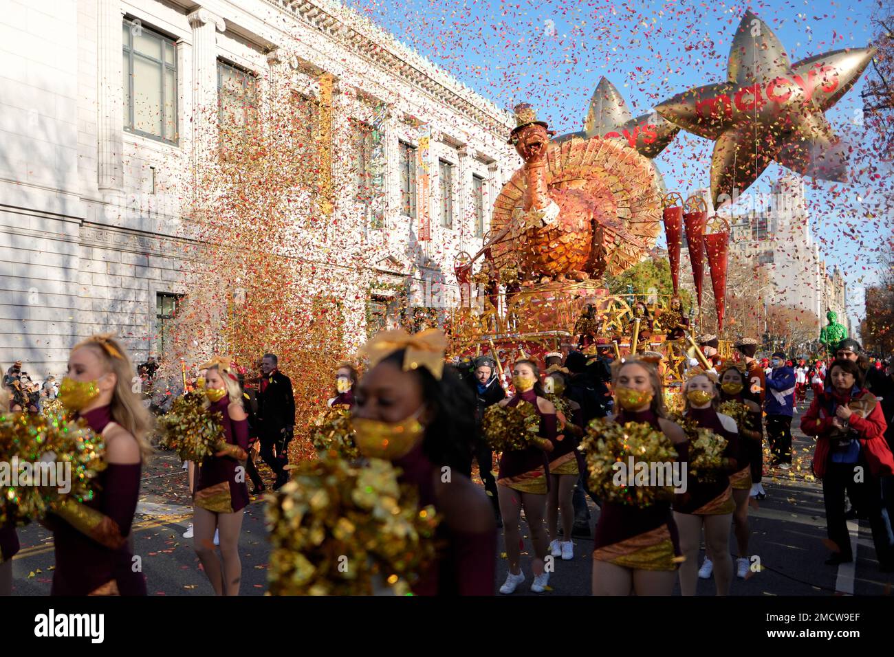 The tom turkey float rides down central park west in the macy s