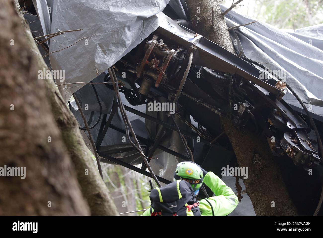 FILE A rescuer takes a picture of a clamp that was placed on an
