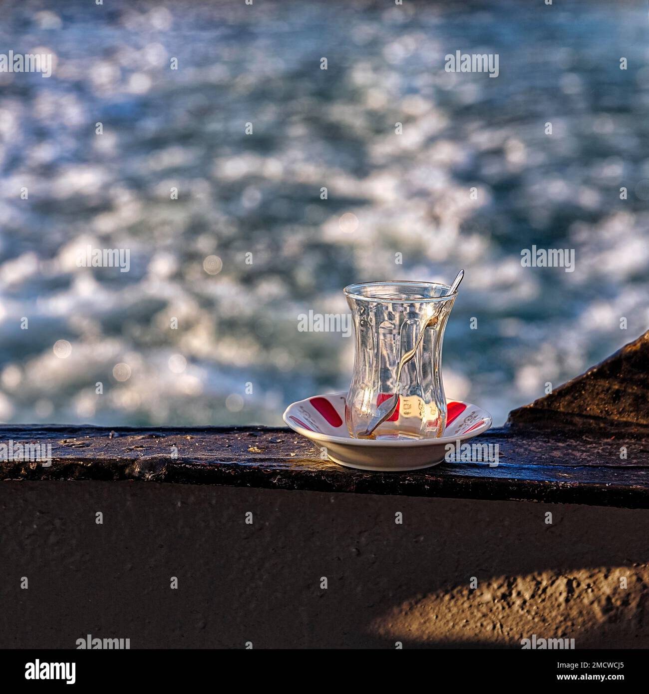 Empty Transparent Glass Tea Cup With Handle On Glass Saucer Closeup On A  White Background Stock Photo, Picture and Royalty Free Image. Image  92433293.