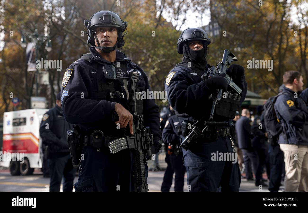 New York Police special operations officers stand watch during the Macy
