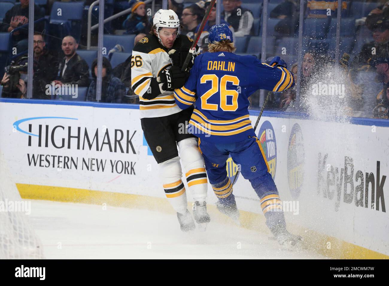 Boston Bruins' left wing Erik Haula (56) checks Buffalo Sabres
