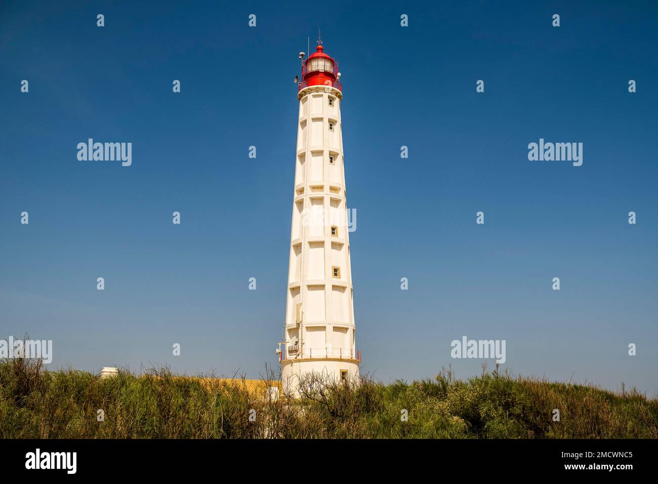 Lighthouse at Farol Island, Faro District, Algarve, south Portugal Stock Photo
