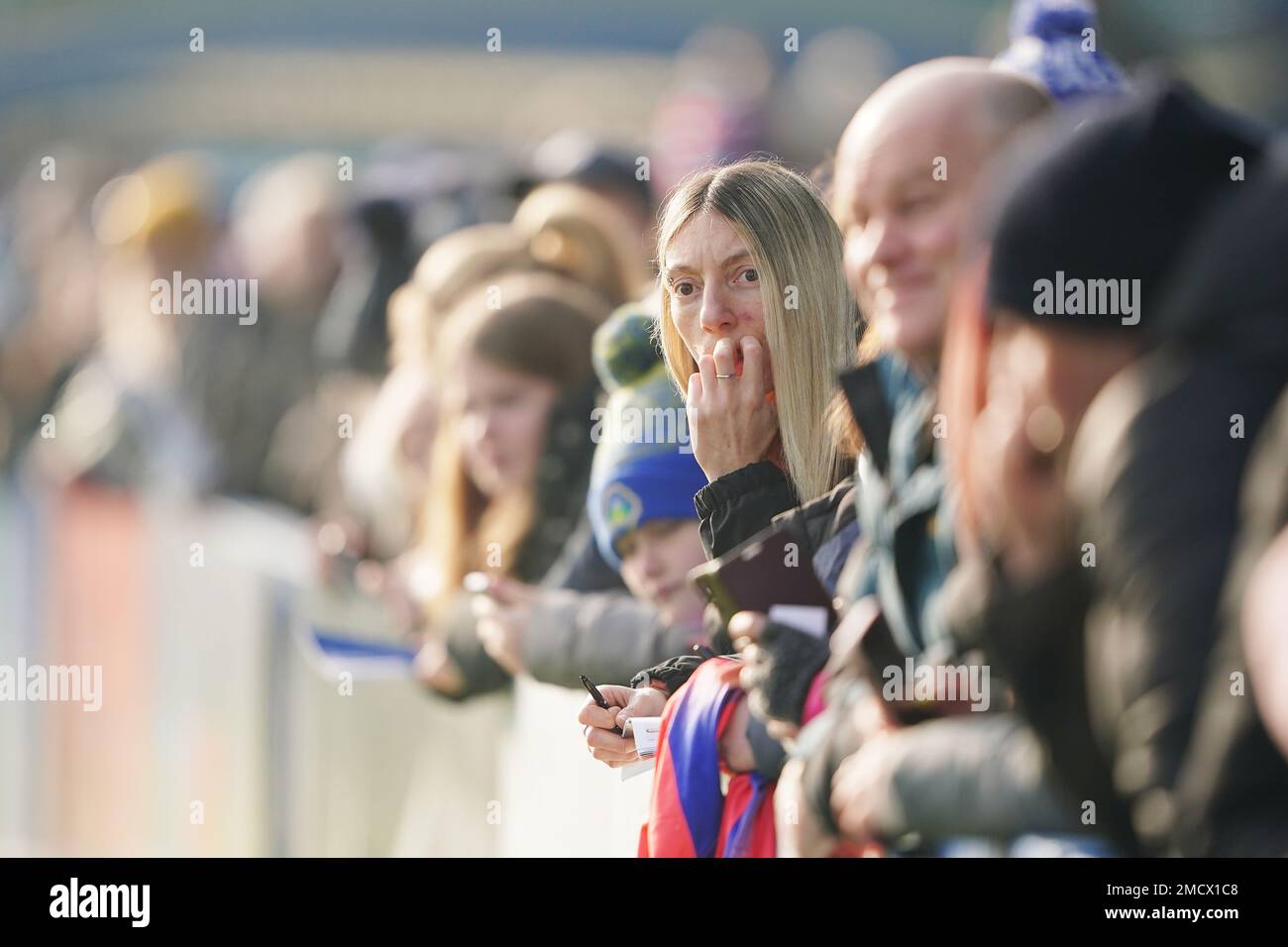 Fans watch on during the Barclays Women's Super League match at Kingsmeadow, London. Picture date: Sunday January 22, 2023. Stock Photo