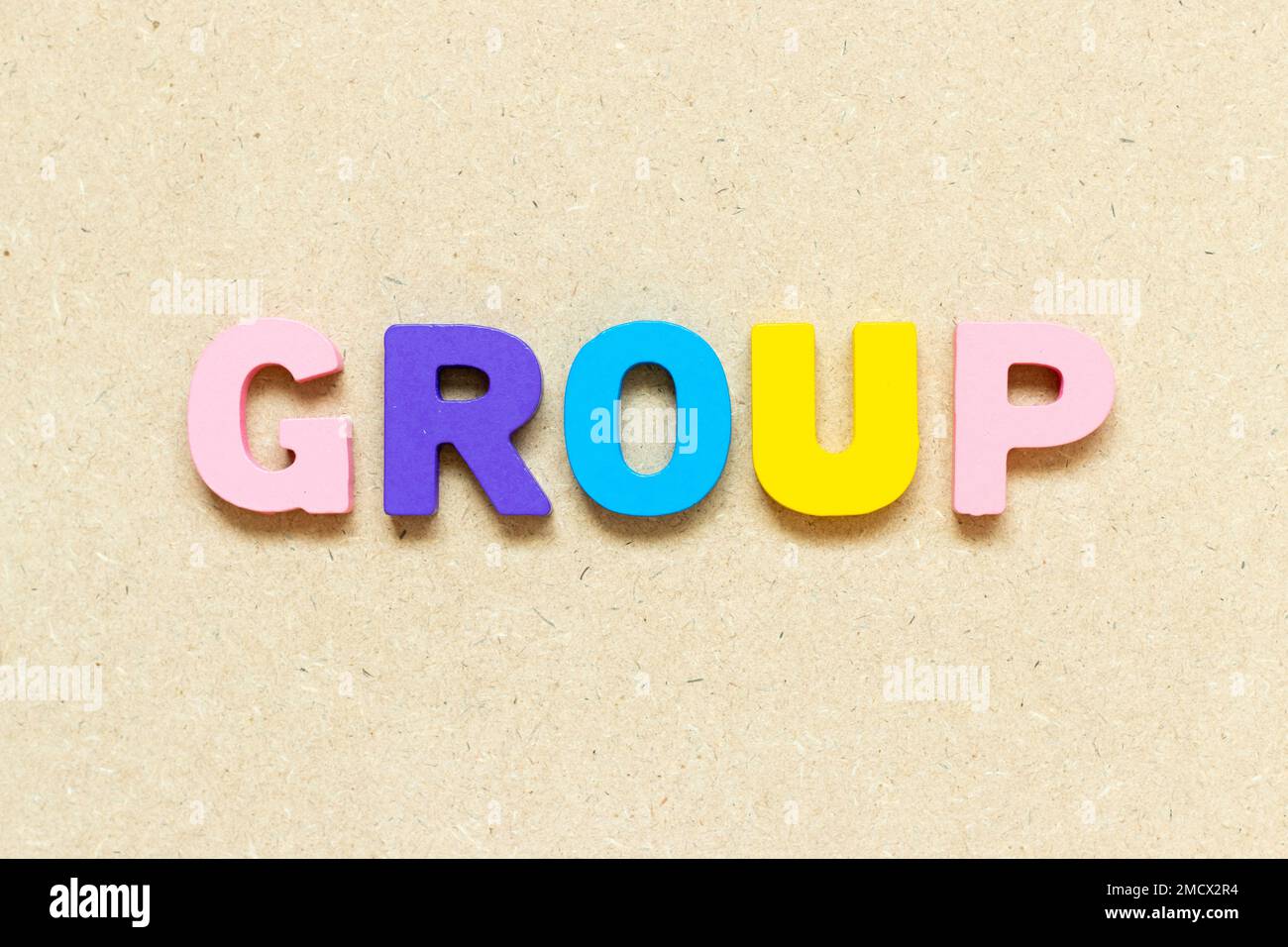 Color alphabet letter with word group on wood background Stock Photo