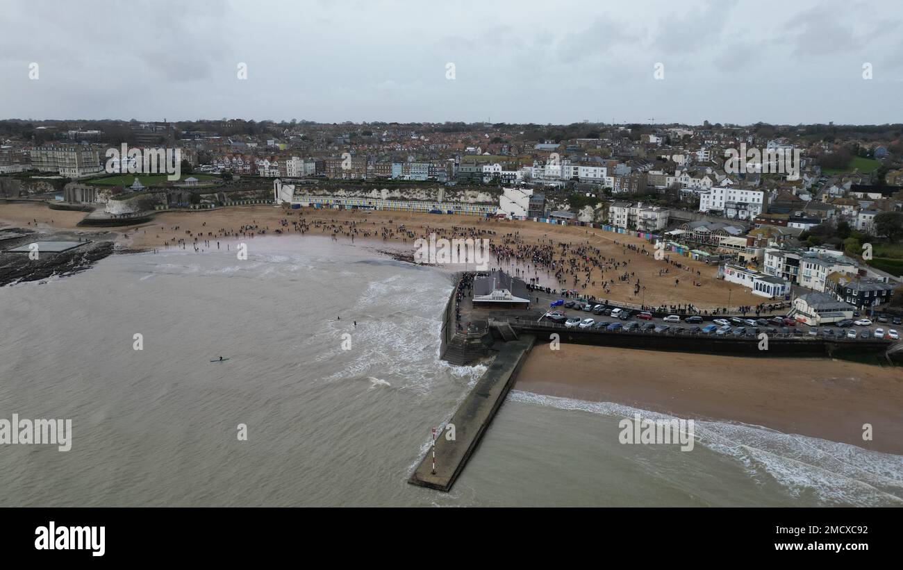 An aerial view of crowded Broadstairs Beach and jetty on the sea in the