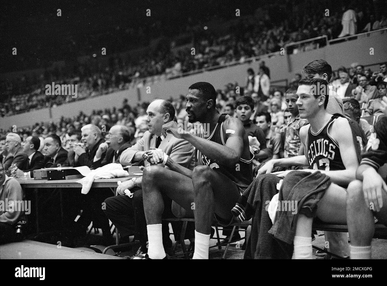 https://c8.alamy.com/comp/2MCXGPG/file-boston-coach-red-auerbach-and-bill-russell-watch-action-as-they-shake-hands-on-the-bench-in-the-final-seconds-of-the-celtics-112-99-win-over-the-lakers-in-an-nba-playoff-game-at-los-angeles-april-23-1965-russell-had-just-left-the-game-for-the-first-time-with-less-than-a-minute-to-play-ap-photoed-widdis-file-2MCXGPG.jpg