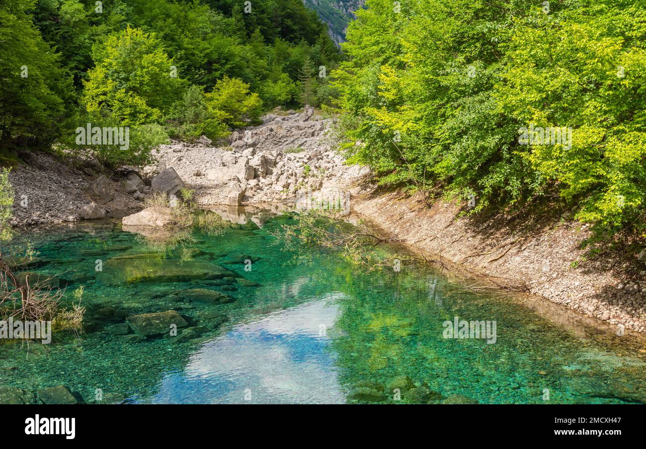 the ephemeral ponds of Tovel: small pearls with turquoise and indigo hues set within the basins of the extensive stony ground of Tovel’s Glares,Italy Stock Photo