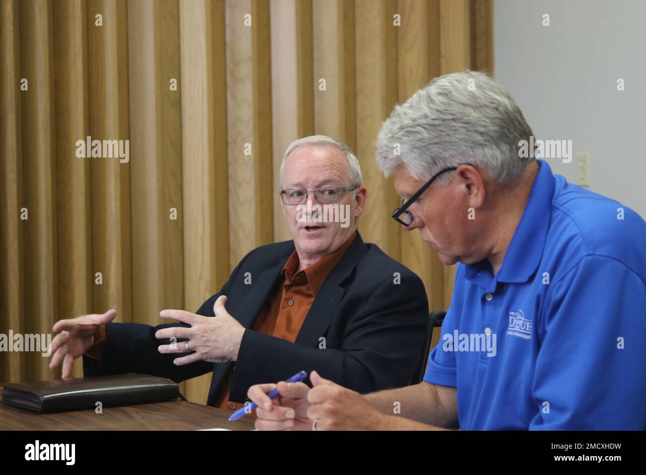 Kelly McNeese, chief of staff, 88th Readiness Division, left, chats