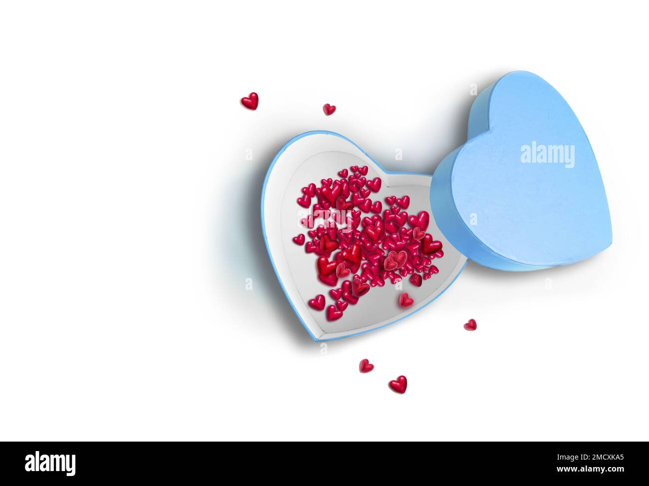 Open heart shaped gift box with red hearts on white background. Design for Valentine's Day. Stock Photo