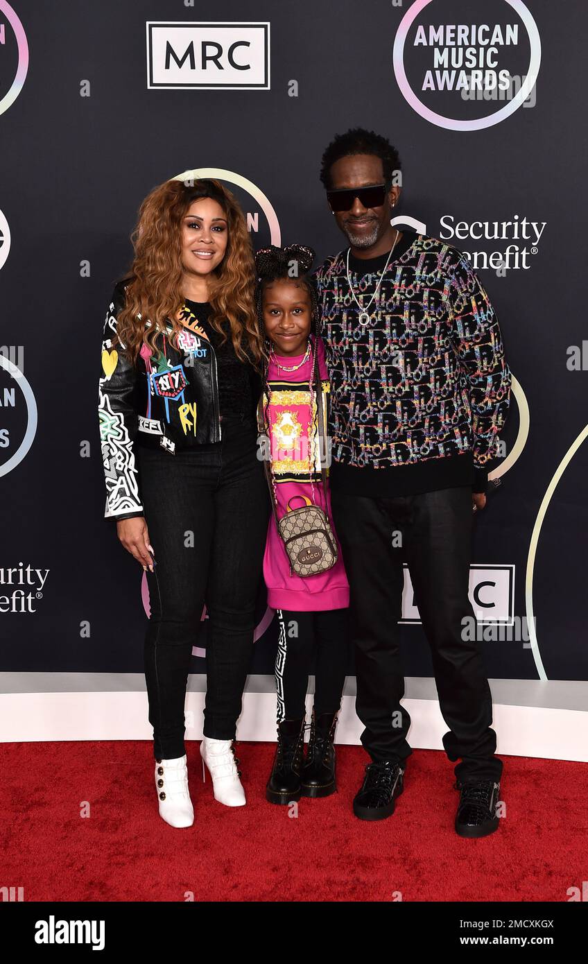 Shawn Stockman, right, Sharonda Jones, left, and their daughter