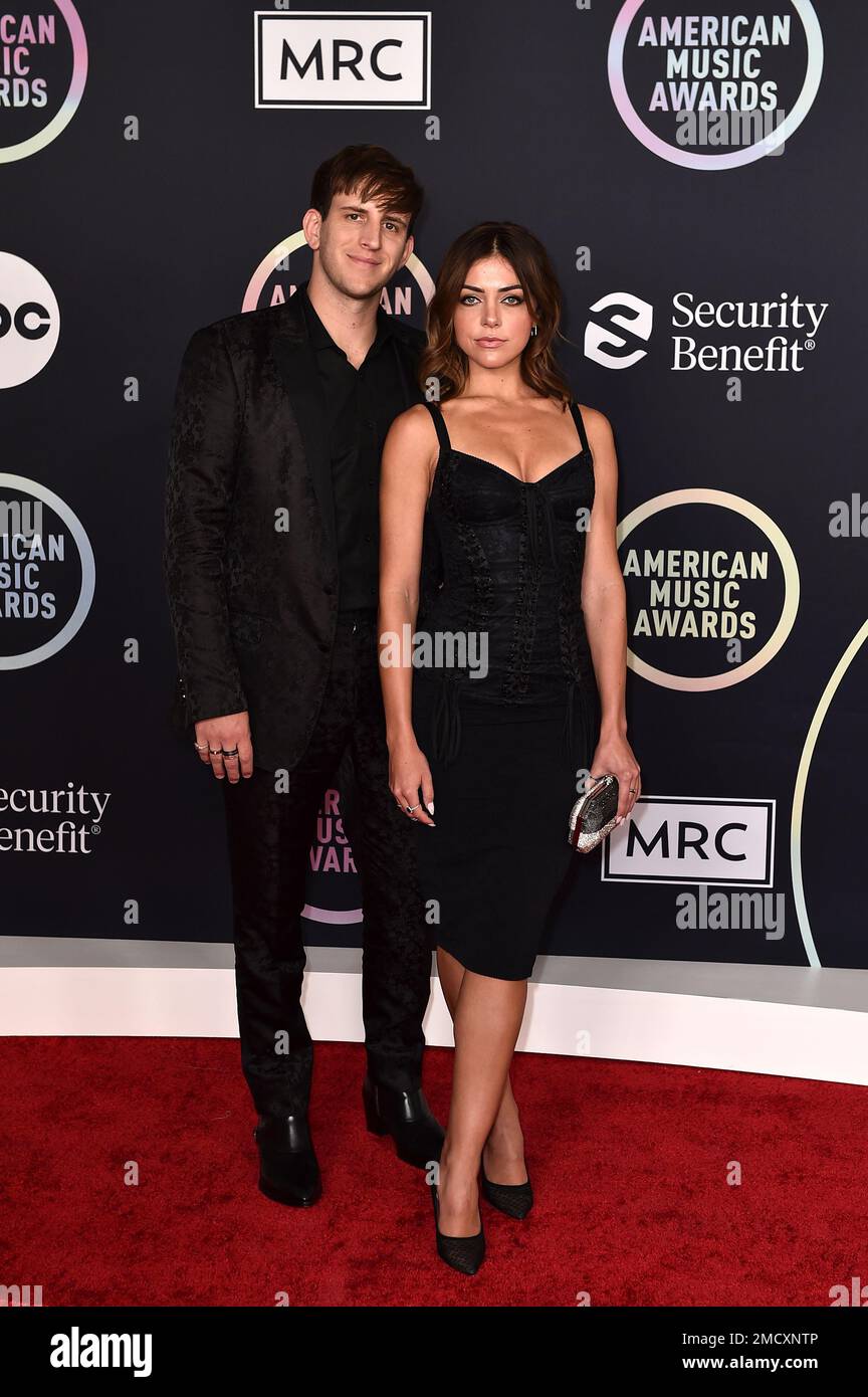 Illenium, left, and Lara McWhorter arrive at the American Music Awards