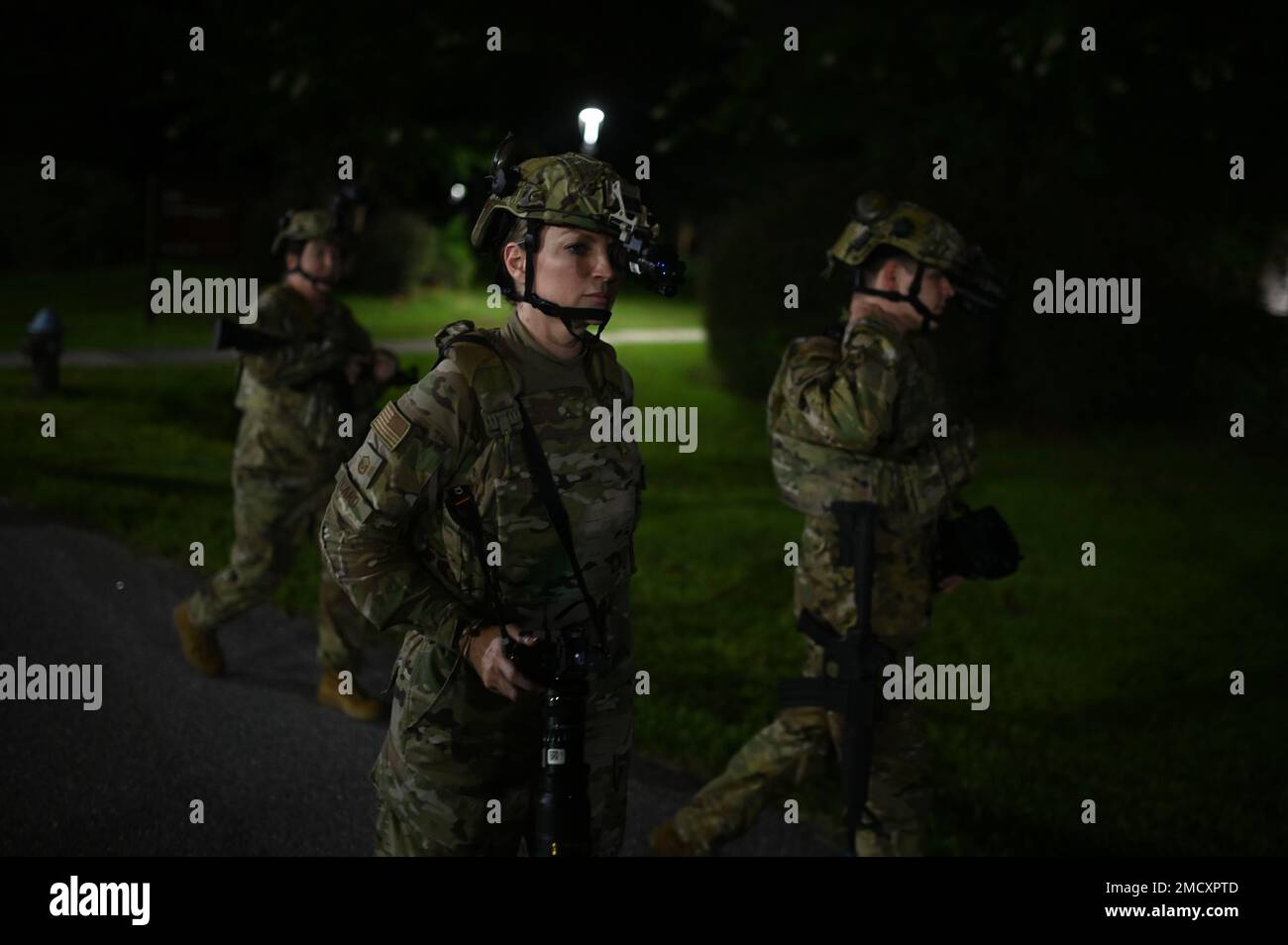 Master Sgt. Amy Picard, a member of 4th Combat Camera Squadron conducts ...