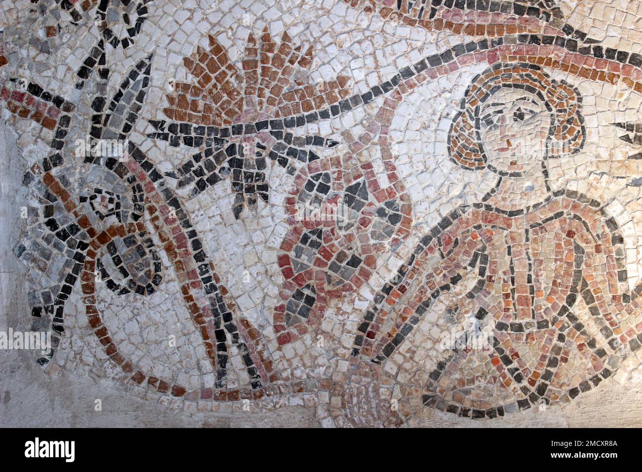 Ajloun Castle, Jordan -  Byzantine mosaic of woman and donkey Stock Photo