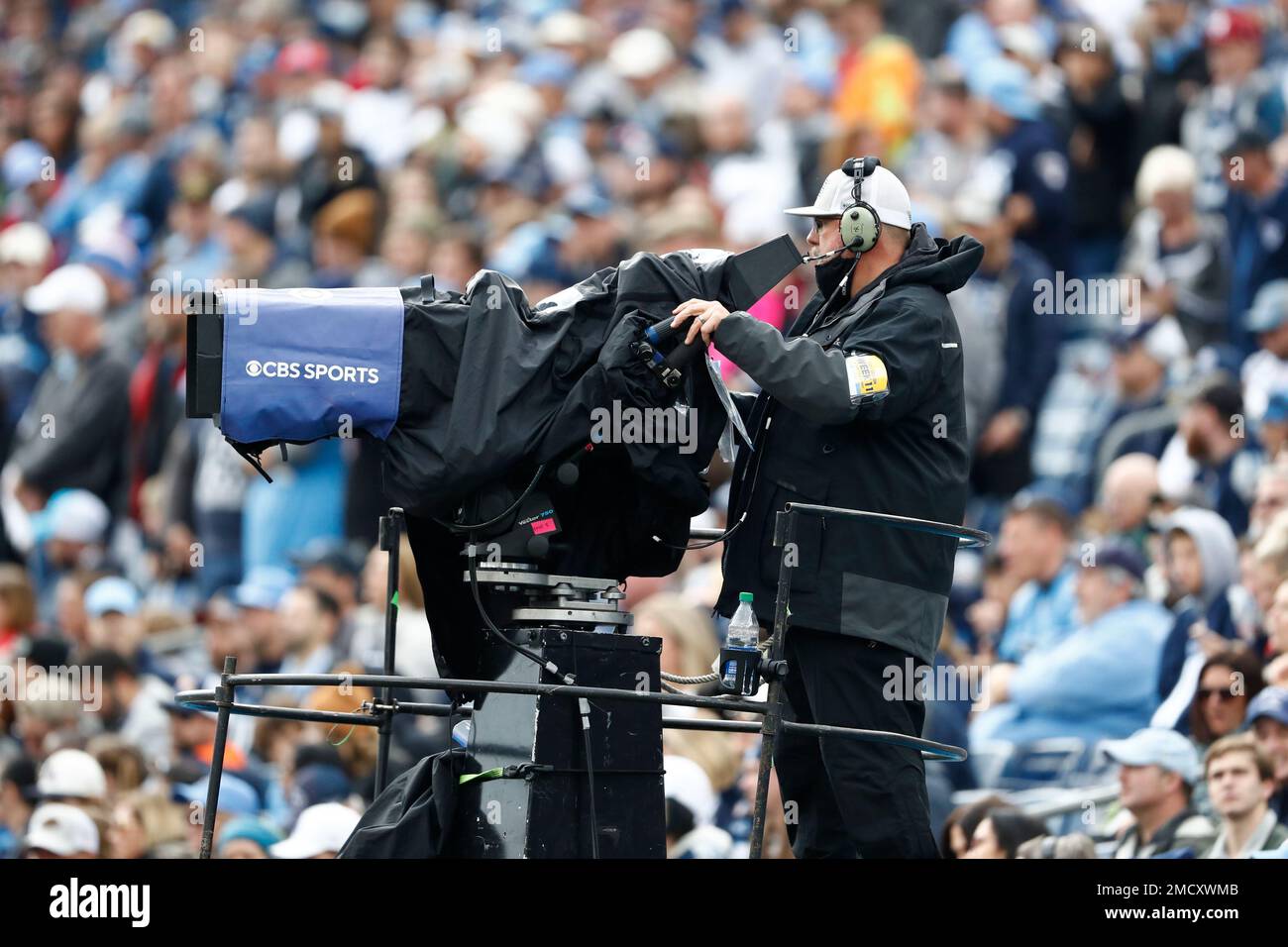 A CBS Sports camera operator works in the first half of an NFL