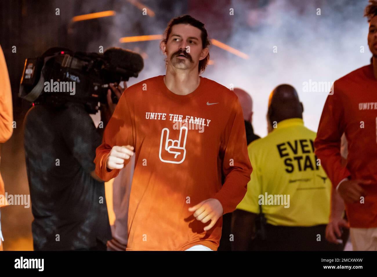 Texas guard Avery Benson comes onto the court before an NCAA college