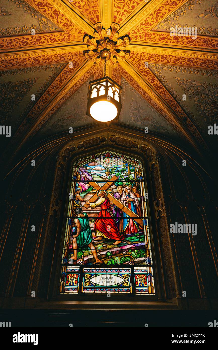 A vertical of a colorful glass painting, stained glass in Notre Dame