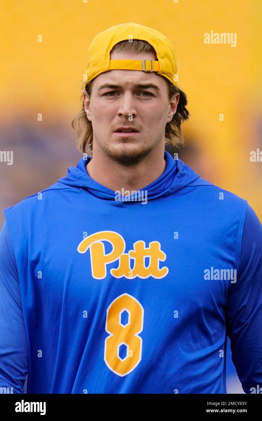 Pittsburgh quarterback Kenny Pickett (8) warms up before an NCAA