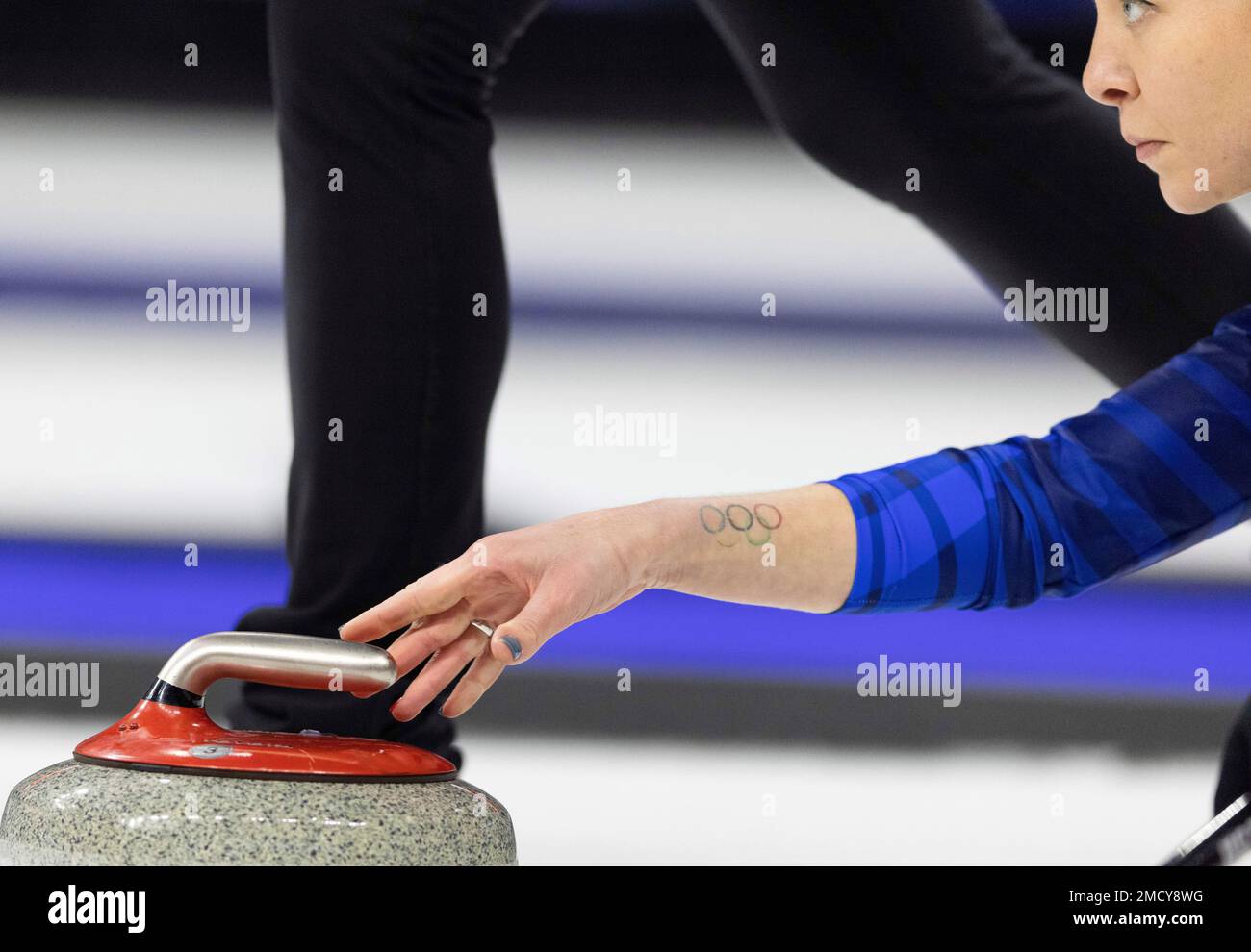 Team Peterson's Nina Roth releases the rock while competing against