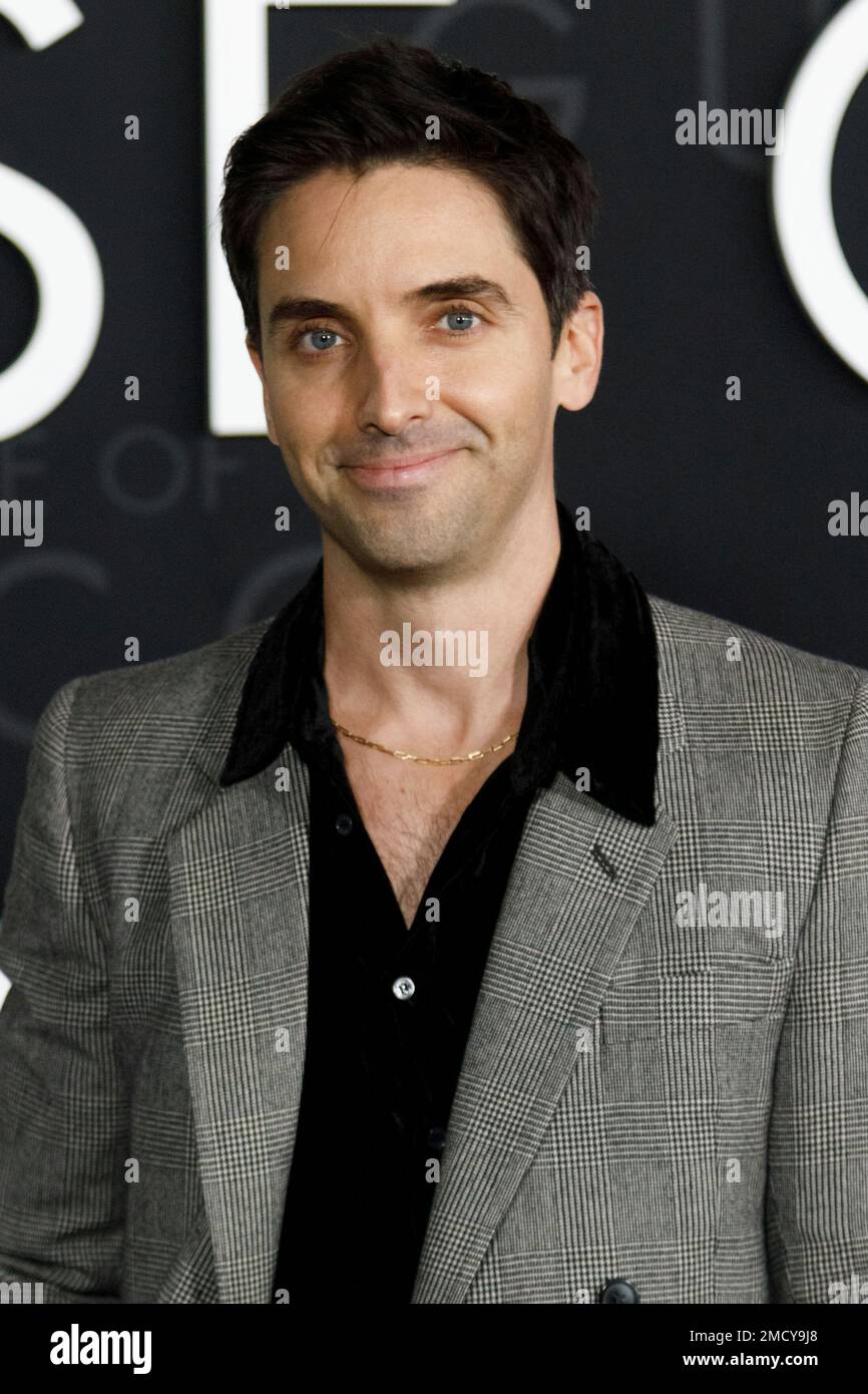Paul W. Downs arrives at “The House of Gucci” LA premiere at the