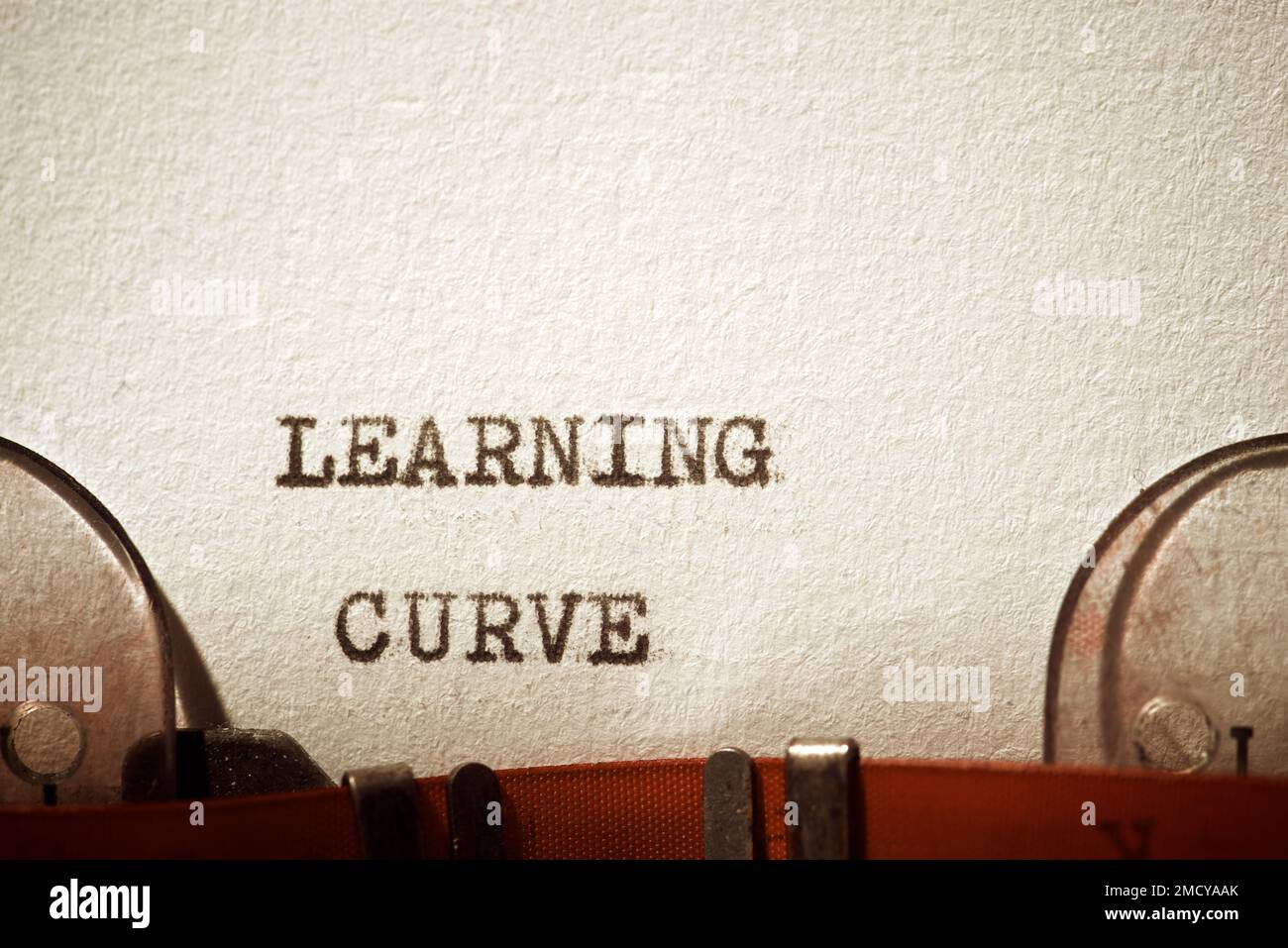 Learning curve phrase written with a typewriter Stock Photo - Alamy