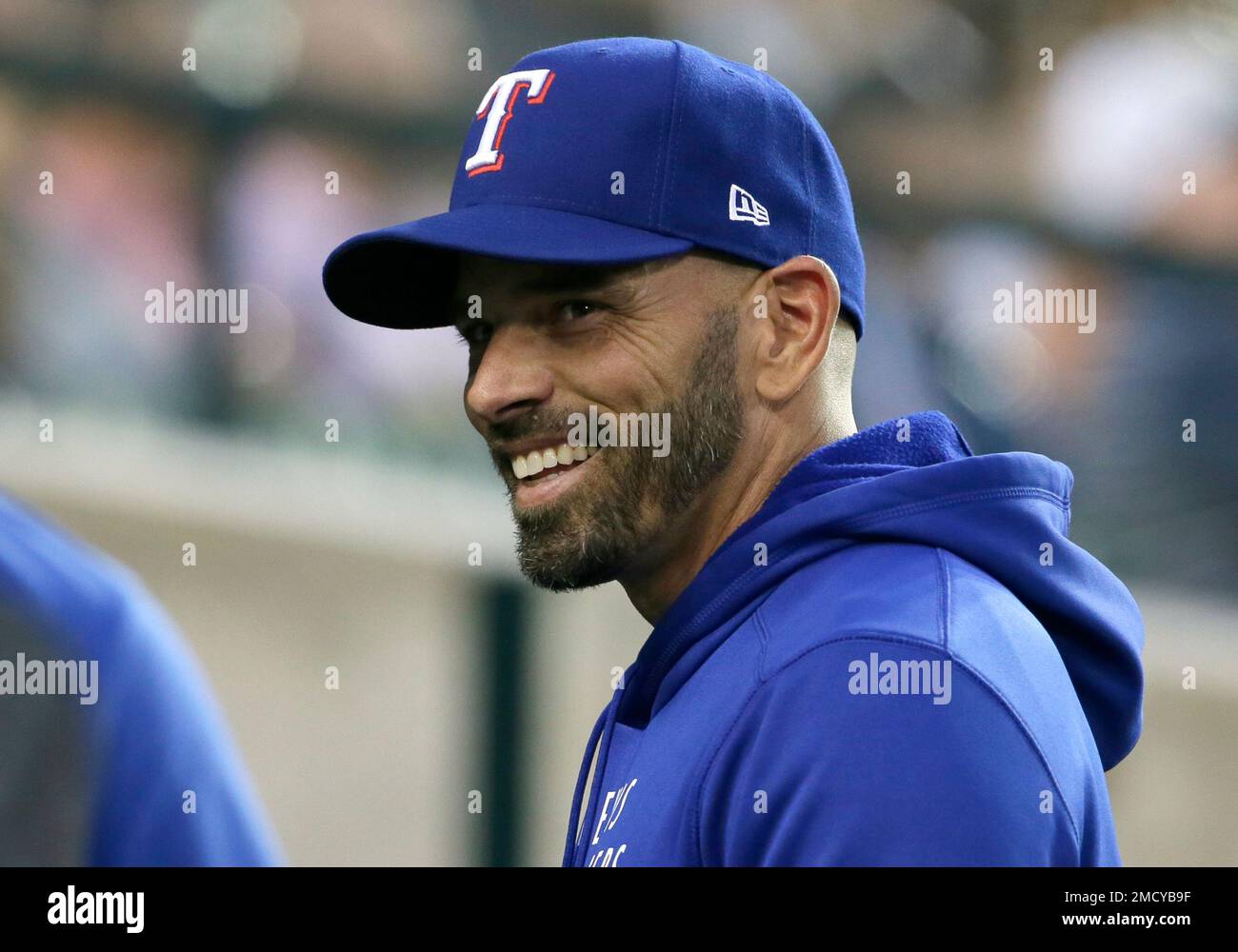 FILE Texas Rangers manager Chris Woodward smiles before a baseball