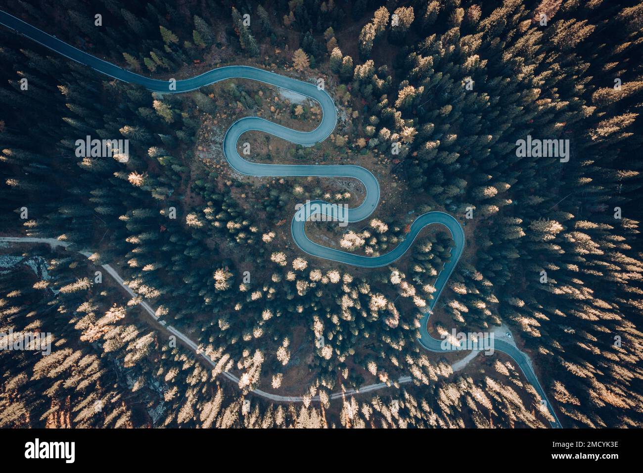 Aerial view of curved asphalt road on the mountain Stock Photo - Alamy