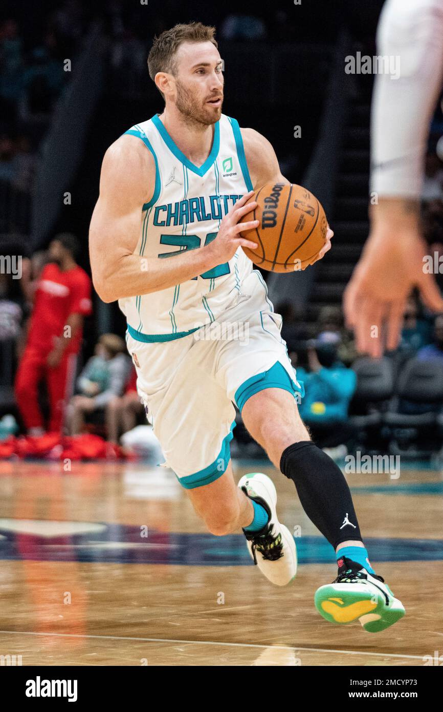 Charlotte Hornets forward Gordon Hayward (20) brings the ball up court  against the Washington Wizards during the first half of an NBA basketball  game in Charlotte, N.C., Wednesday, Nov. 17, 2021. (AP