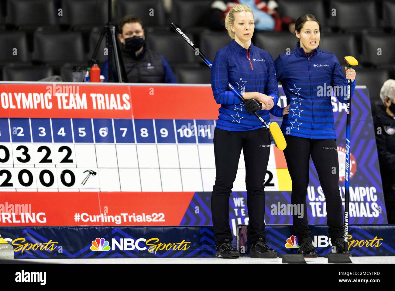 Team Petersons Nina Roth, left, and Tabitha Peterson watch as Team Sinclair takes their turn at the U.S. Olympic Curling Team Trials at Baxter Arena in Omaha, Neb., Wednesday, Nov