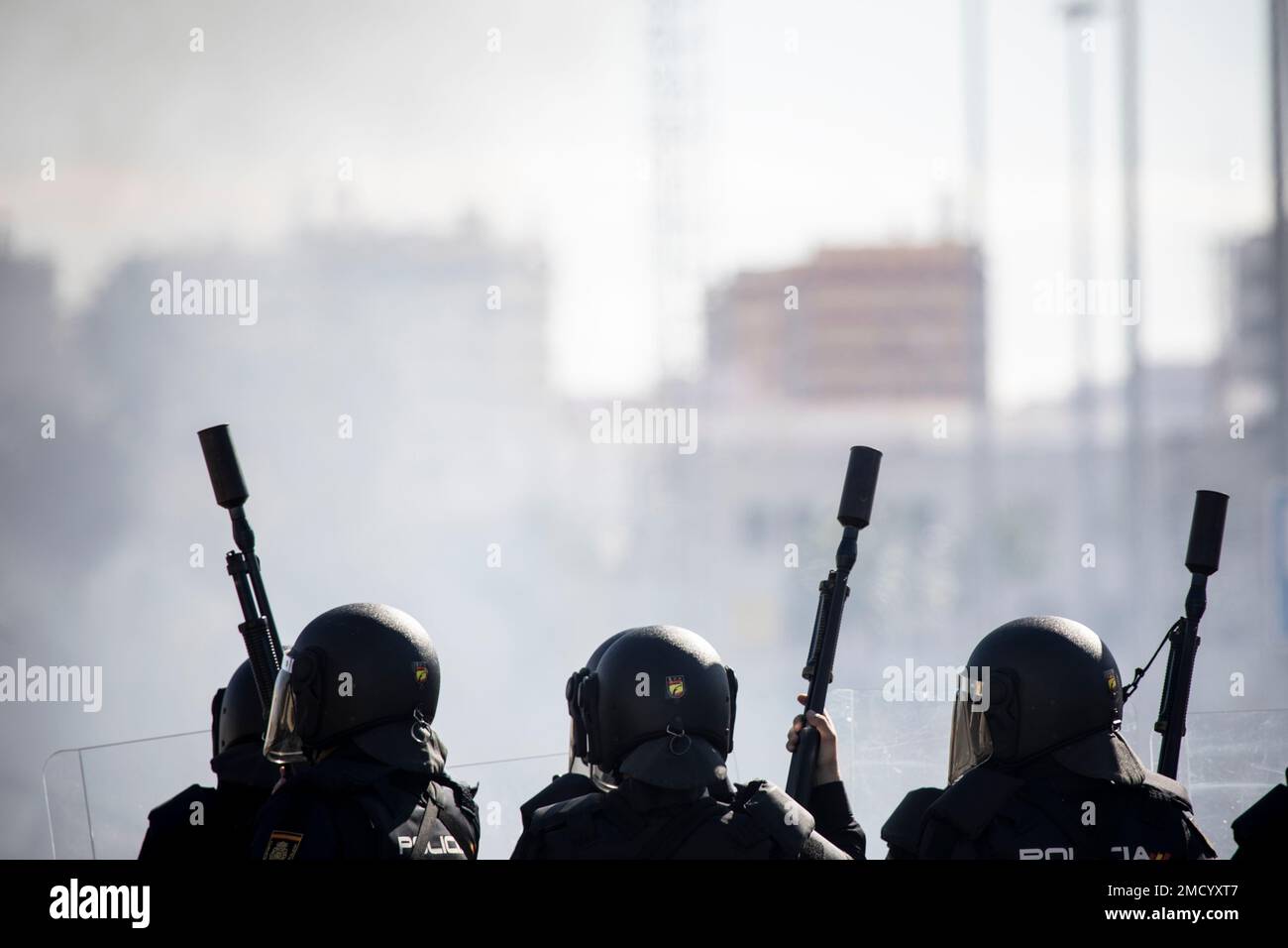 Riot police officers take position during a strike organized by metal ...