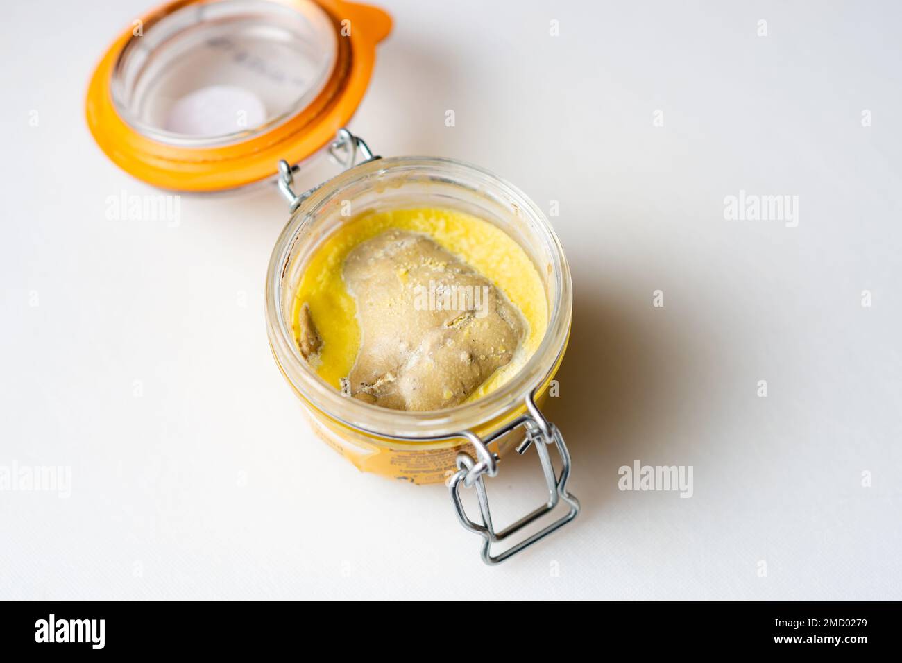 Jar of goose liver foie gras on a white background Stock Photo Alamy