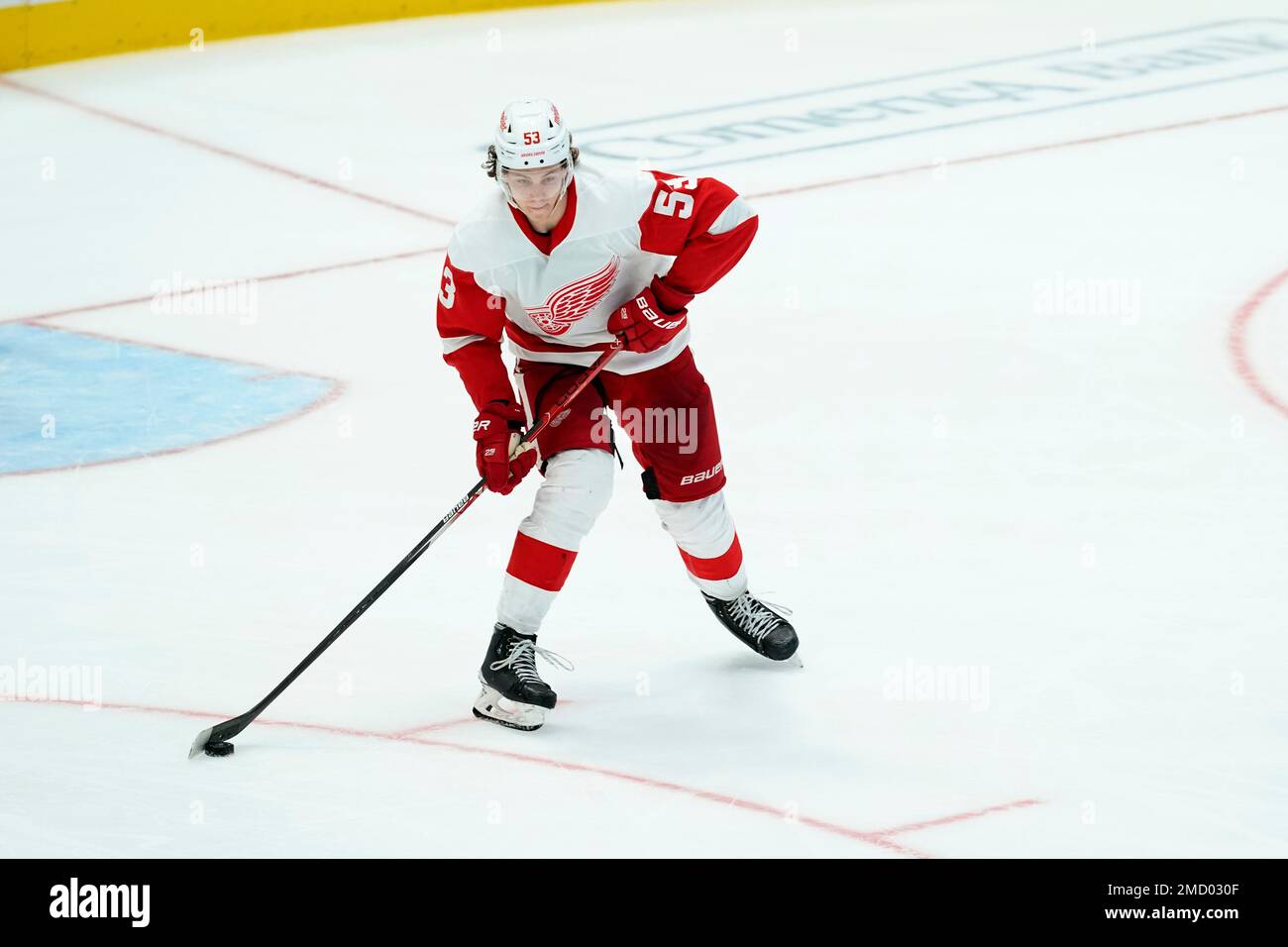 Moritz Seider of the Detroit Red Wings skates the puck against the