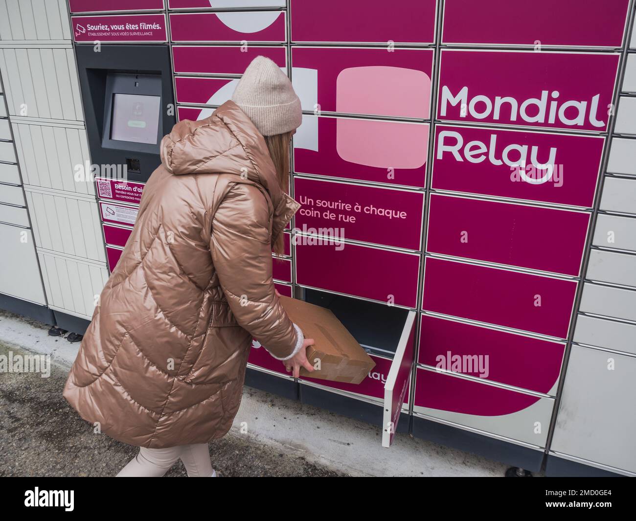Loriol sur Drome, France - January 14, 2023: Picking up a parcel from a ...