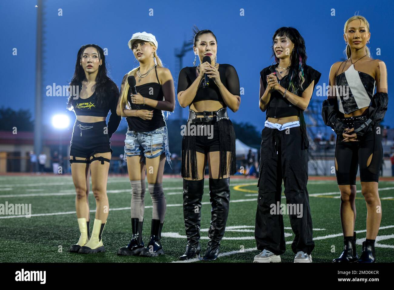 Members of La Chica, a South Korean dance group, perform at the halftime  show during the Legends Soccer Match between a team of U.S. Army Soldiers  and civilians and the 2002 South