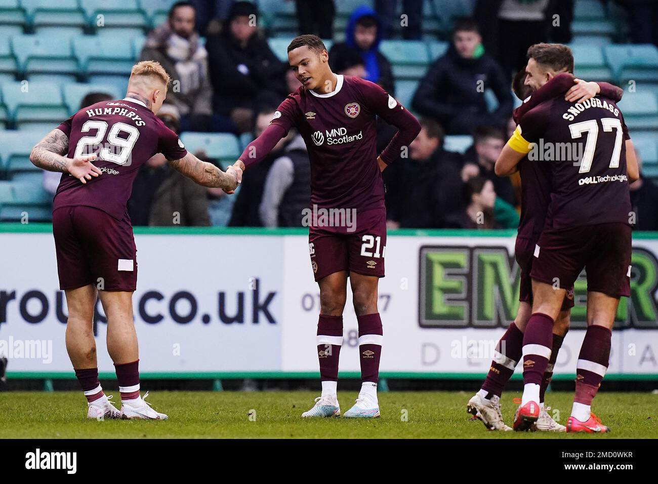 Heart of Midlothian's Toby Sibbick (centre) celebrates scoring their