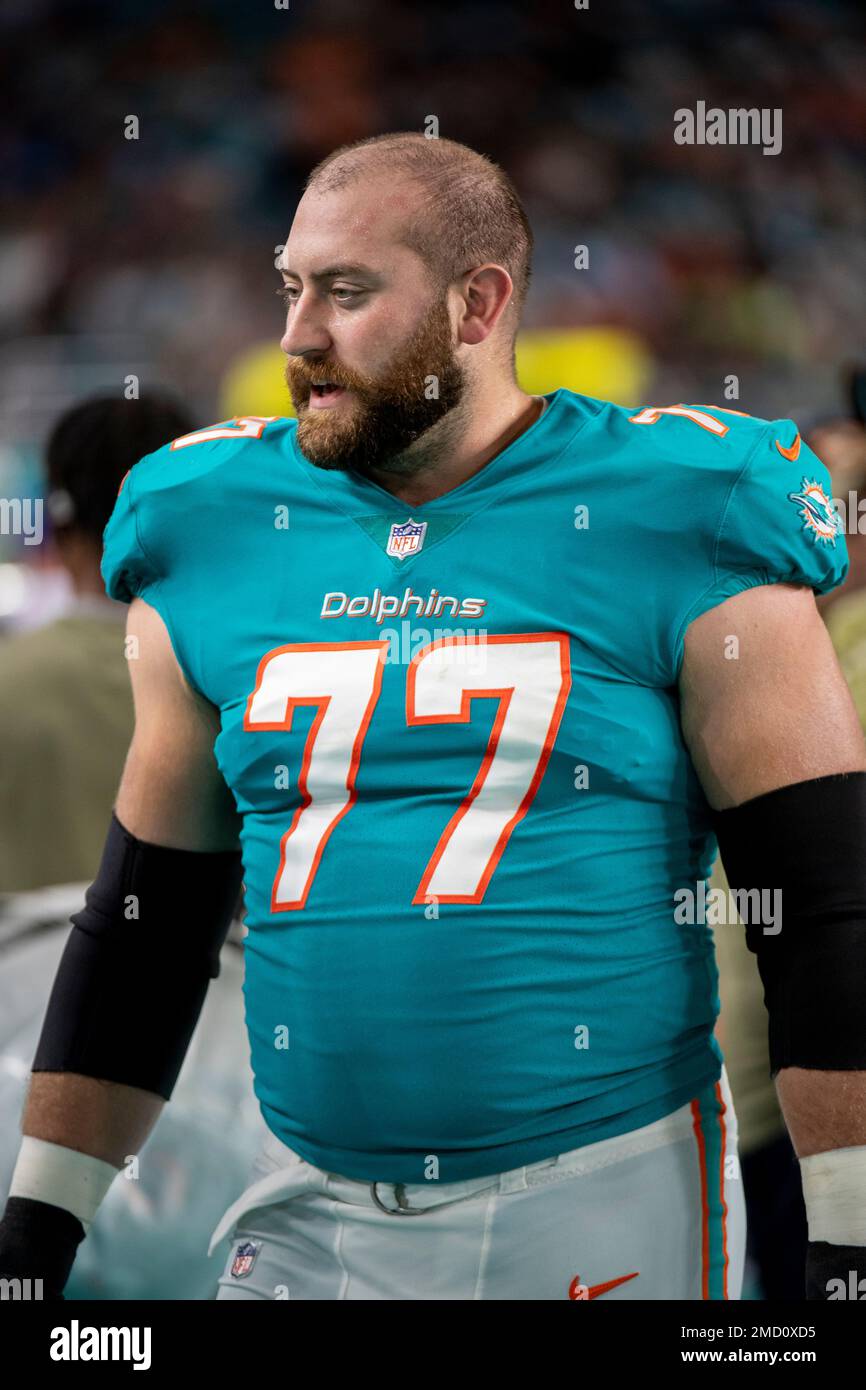 Miami Dolphins guard Jesse Davis (77) walks on the sidelines during an NFL  football game against the Baltimore Ravens, Thursday Nov. 11, 2021, in Miami  Gardens, Fla. (AP Photo/Doug Murray Stock Photo - Alamy