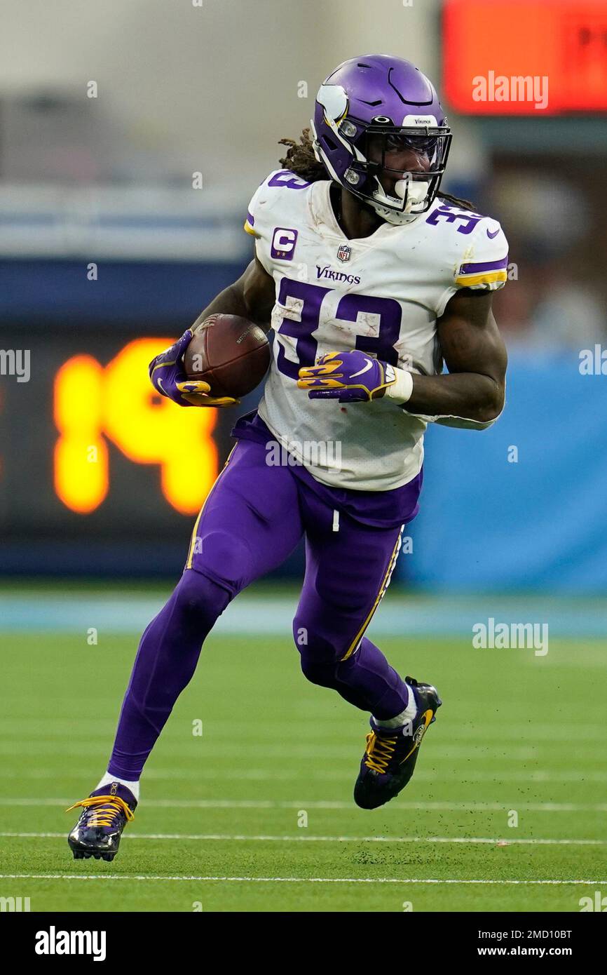 Minnesota Vikings running back Dalvin Cook (33) runs the ball