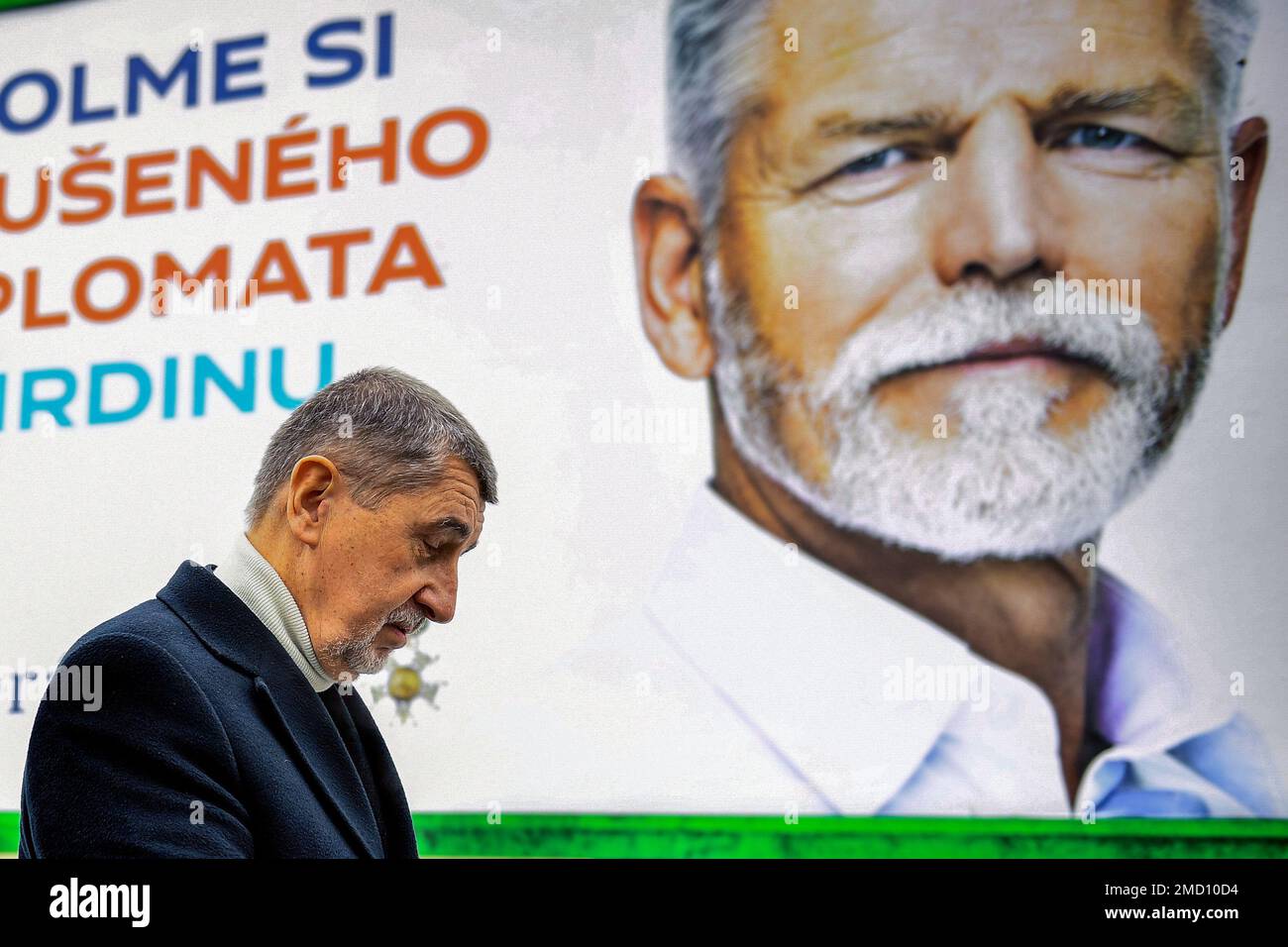 Liberec, Czech Republic. 20th Jan, 2023. Presidential candidate and ANO  chairman Andrej Babis meets citizens in Liberec, Czech Republic, January  20, 2023. Andrej Babis is walking near billboard of presidential candidate  Petr