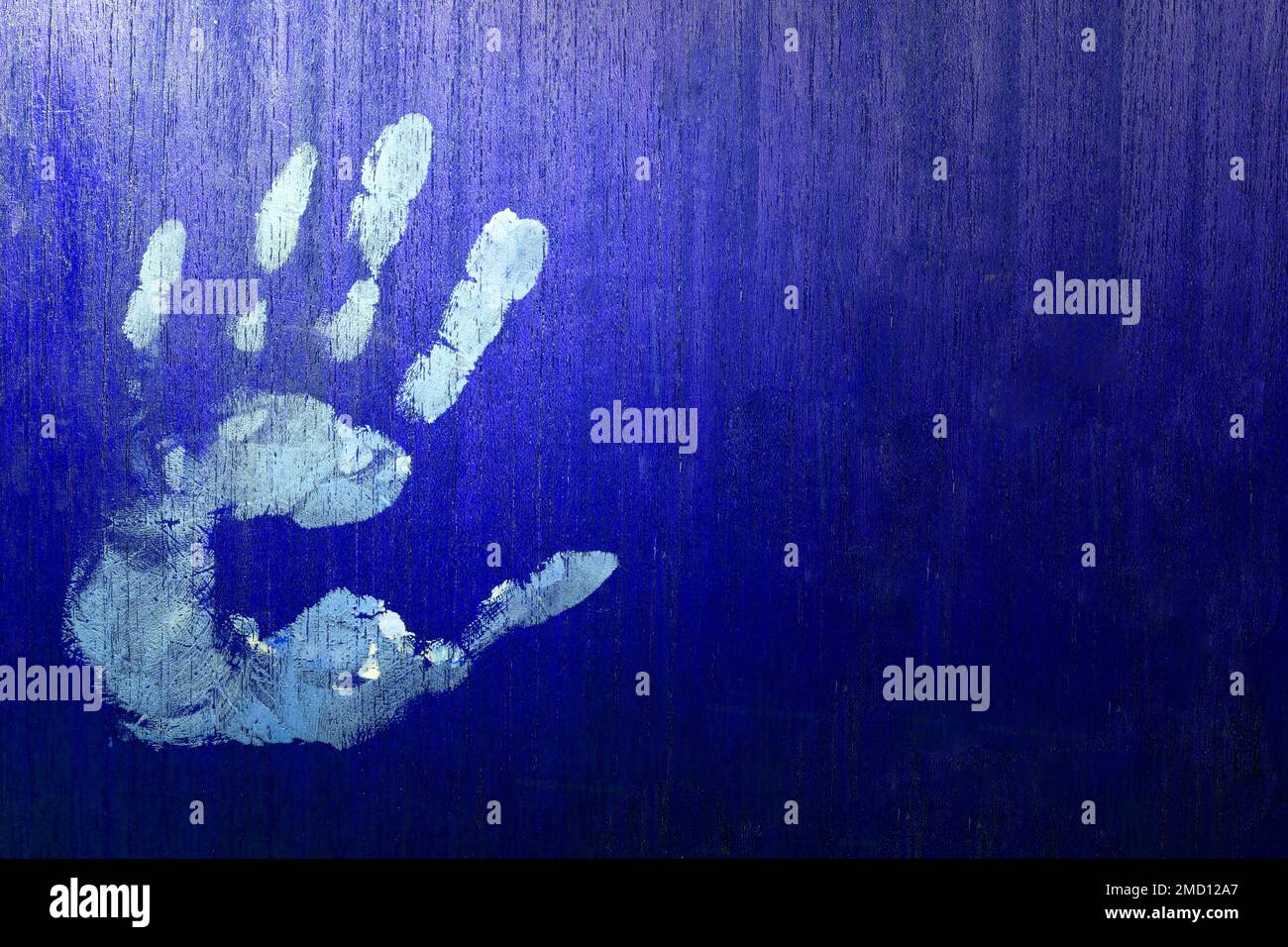 hand painting blue Color child handprint, Artistic kids stamp. with copy space Stock Photo