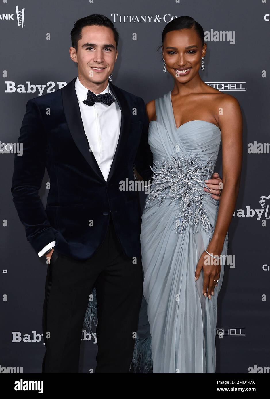 Jasmine Tookes, right, and Juan David Borrero arrive at the Baby2Baby(00)
