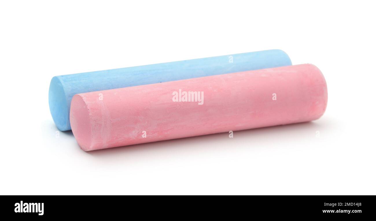 Two colored pieces of chalk isolated on white. Side view. Stock Photo