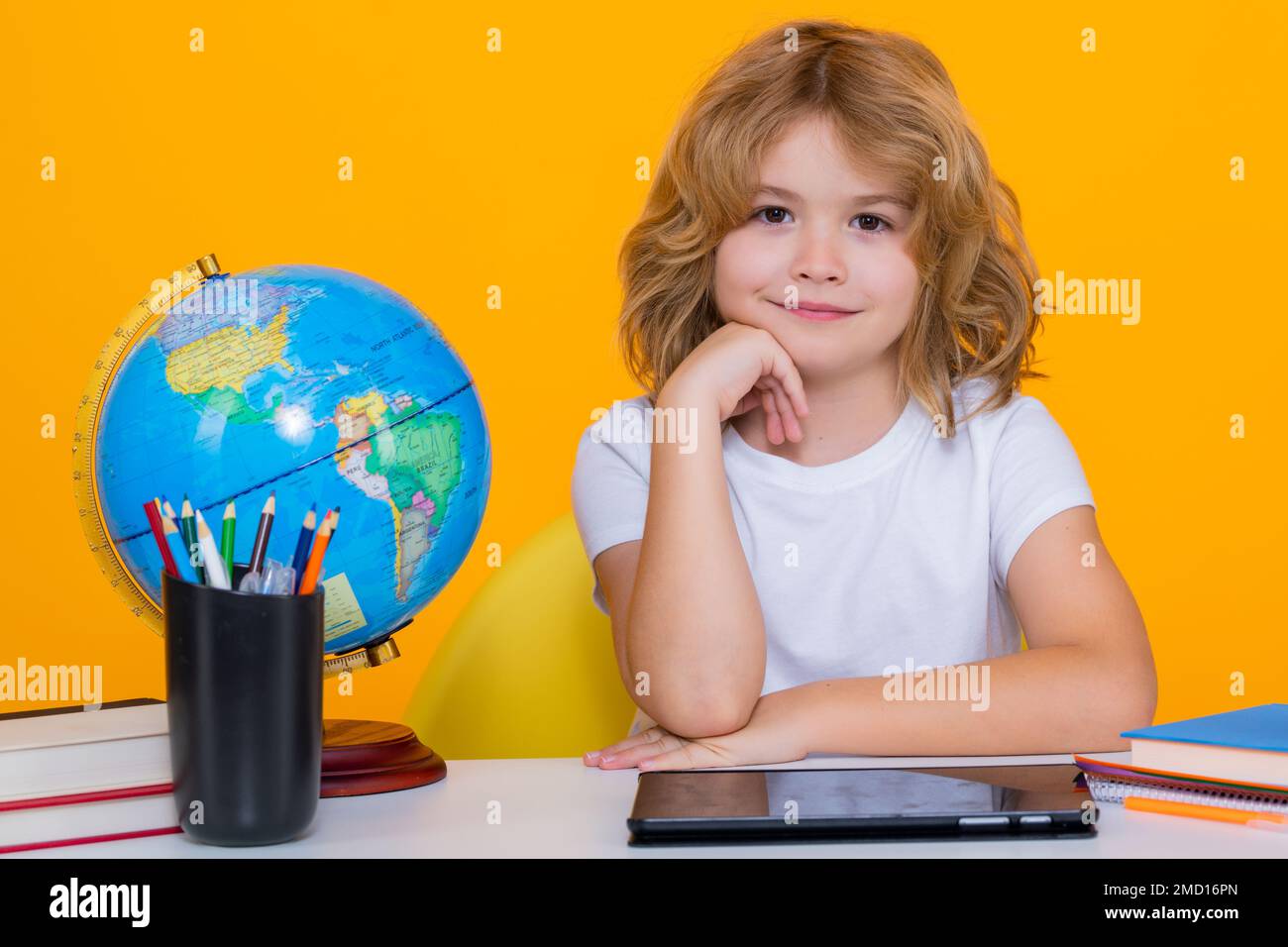 School kid 7-8 years old with book go back to school. Little student. Education concept Stock Photo