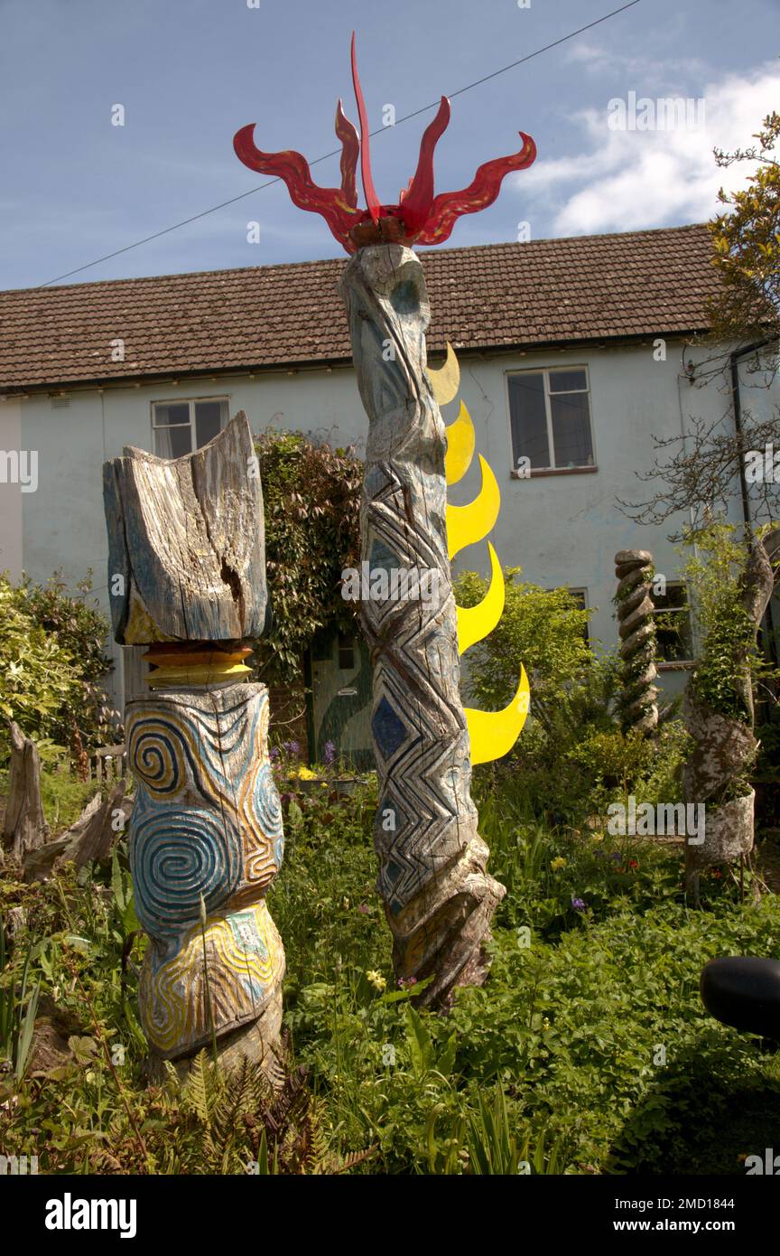 DIY totem poles in garden in Chaffcombe, Somerset Stock Photo - Alamy